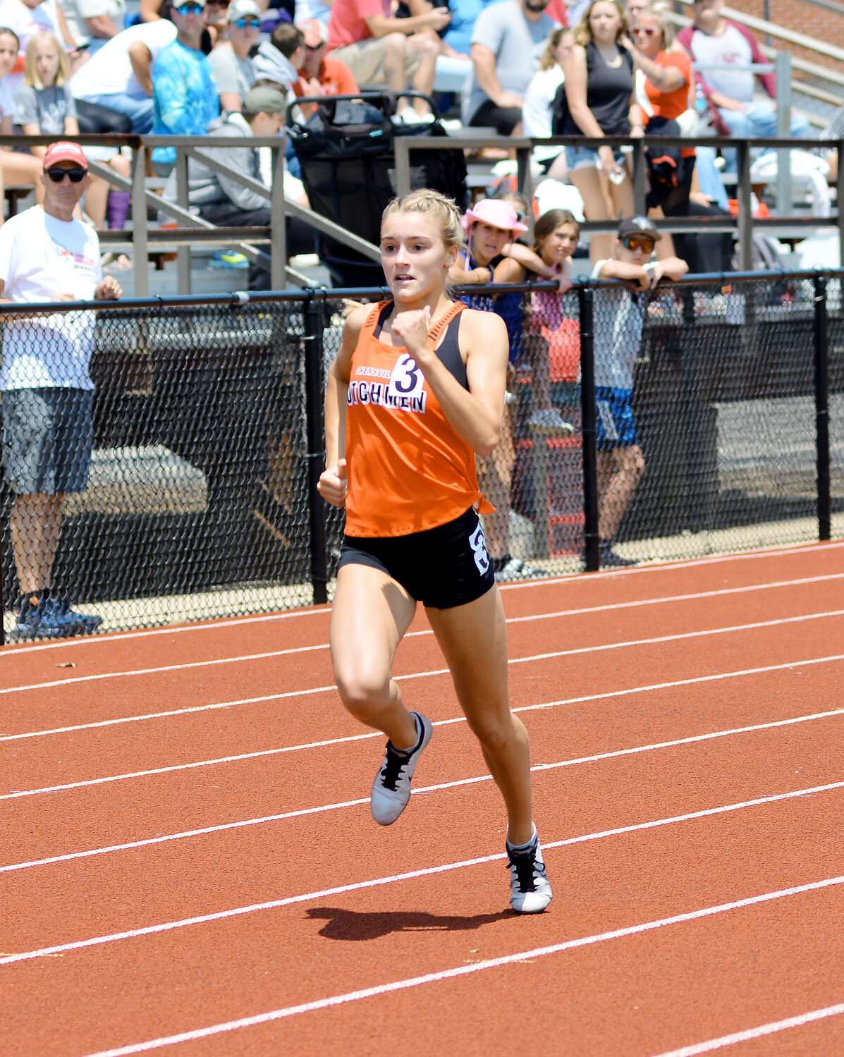 Emma Daniels sprints down the track in the girls 100-meter dash on her way to a second-place finish qualifying her for this weekend’s MSHSAA Class 3-5 State Track and Field Championships in Jefferson City.